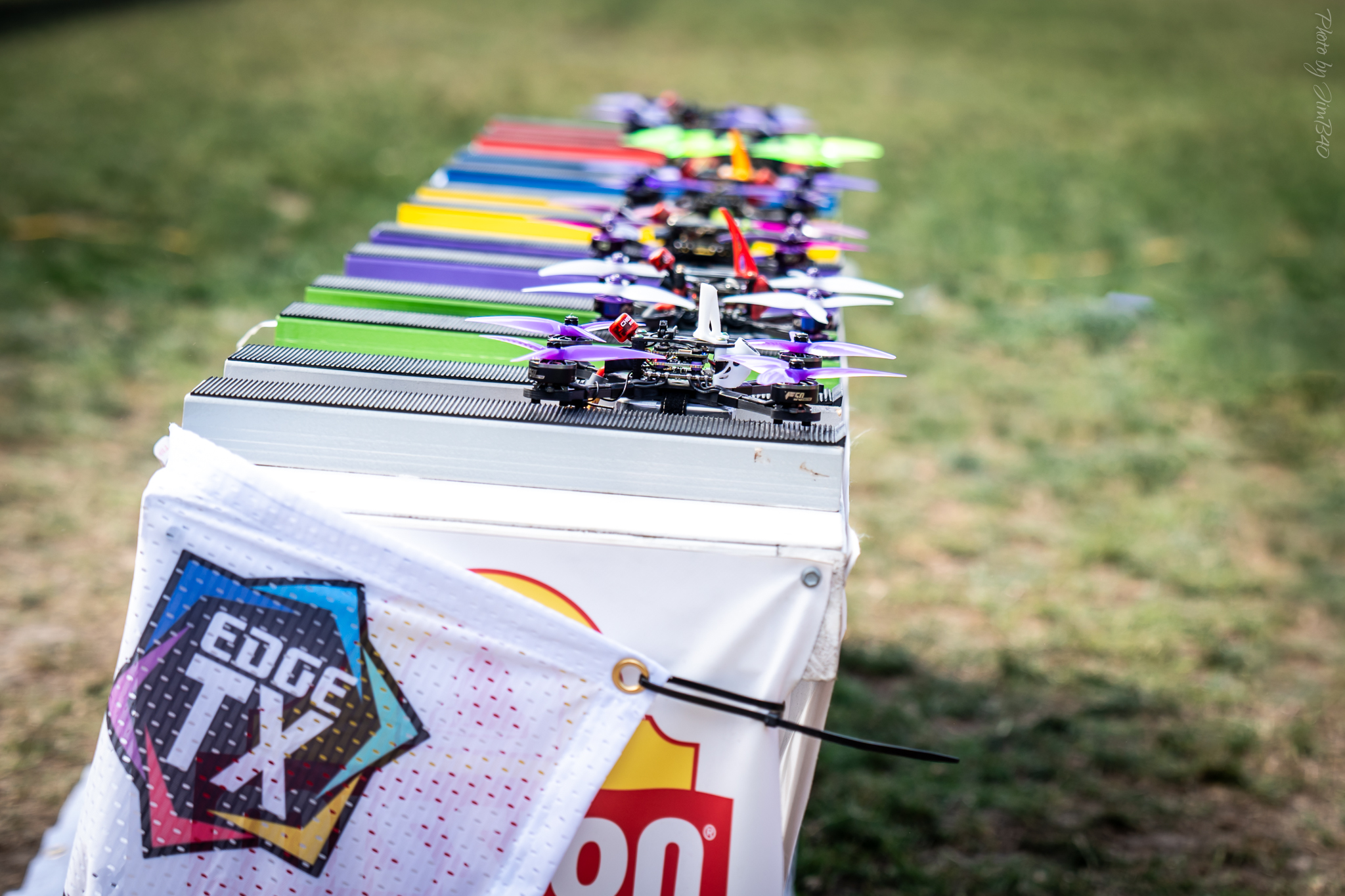 FPV racing drones lined up ready to race